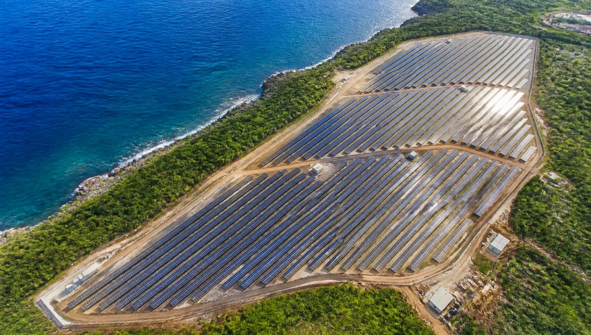 Aerial view of a coastal commercial solar array in Puerto Rico